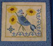 A Bluebird’s Sunflower Serenade